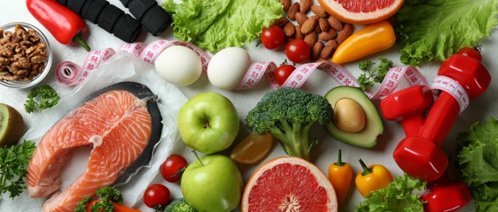 healthy food and red dumbbells on white table 2026 09 22 03 32 26 utc
