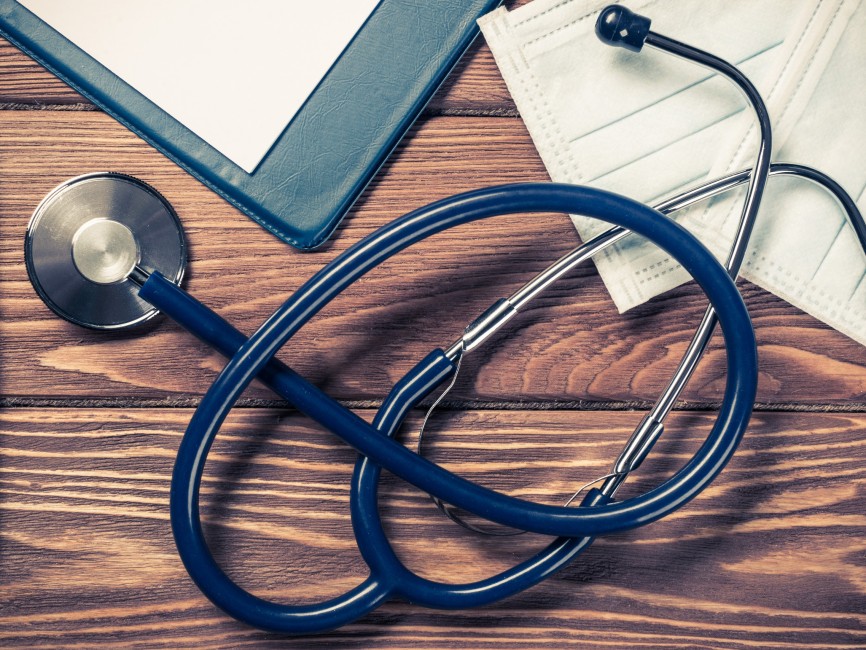 stethoscope and mask on a wooden desk 2026 09 22 14 41 33 utc