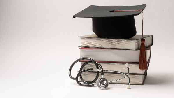 education and healthcare combine on a stack of boo 2026 01 08 22 47 36 utc 16 9
